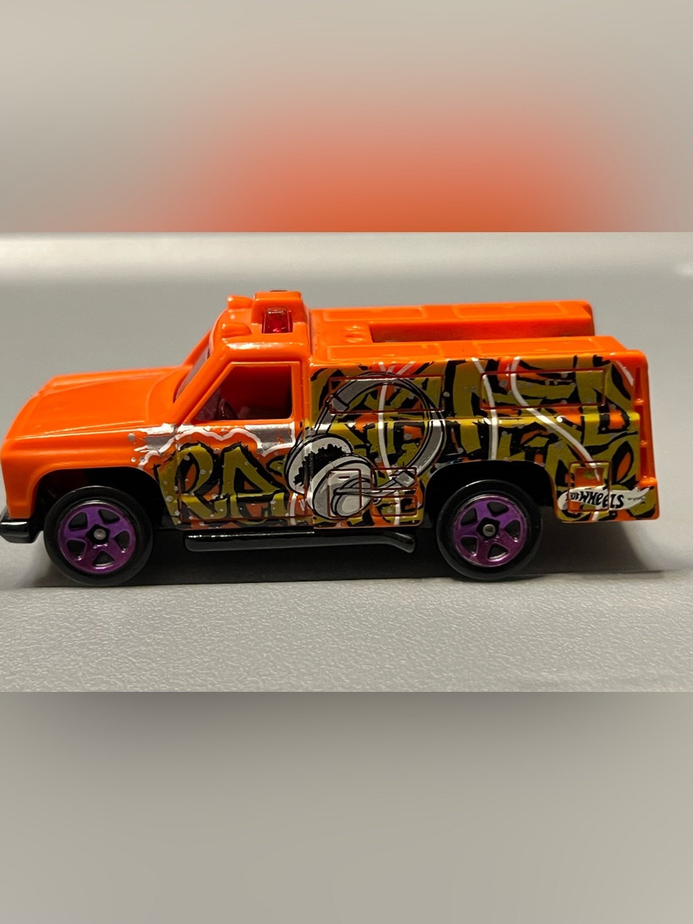 Mattel Neon Orange HW Rapid Responder Graffiti Truck with Purple Wheels